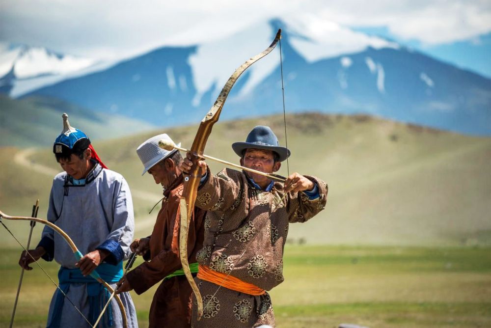 Archers doing archery in Mongolian Nadaam