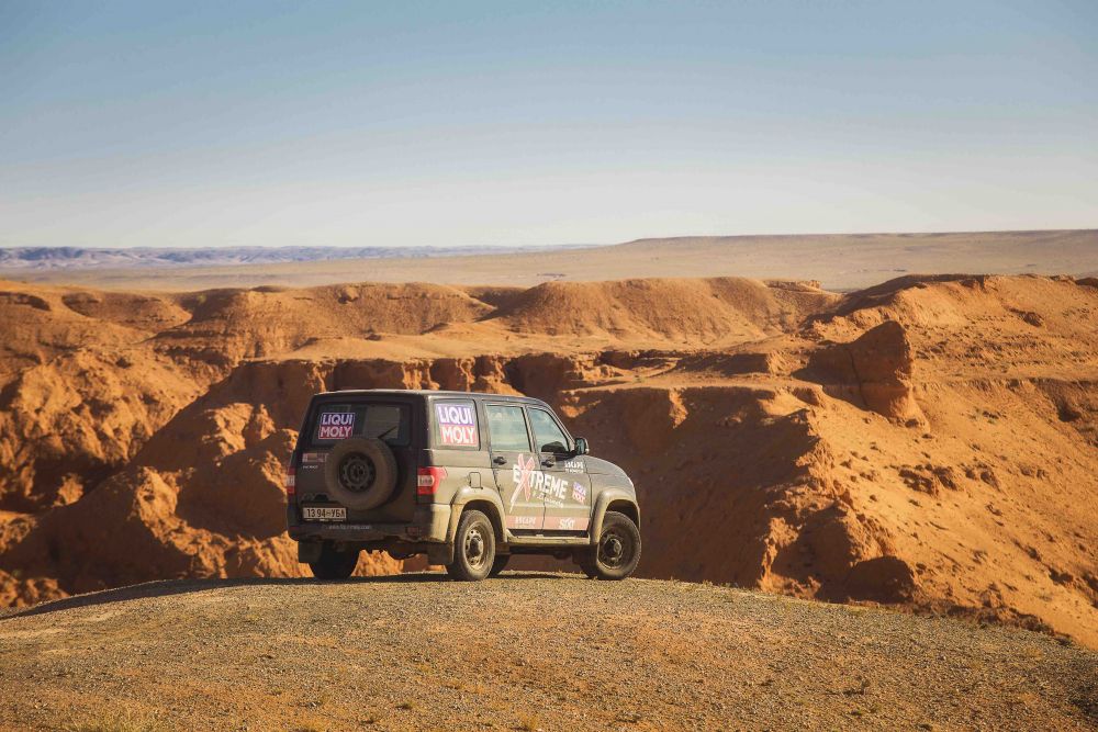 Nomadic horseback riders in the vast expanse of the Gobi desert